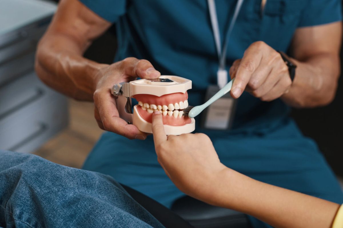 demonstrating-dental-hygiene-with-toothbrush