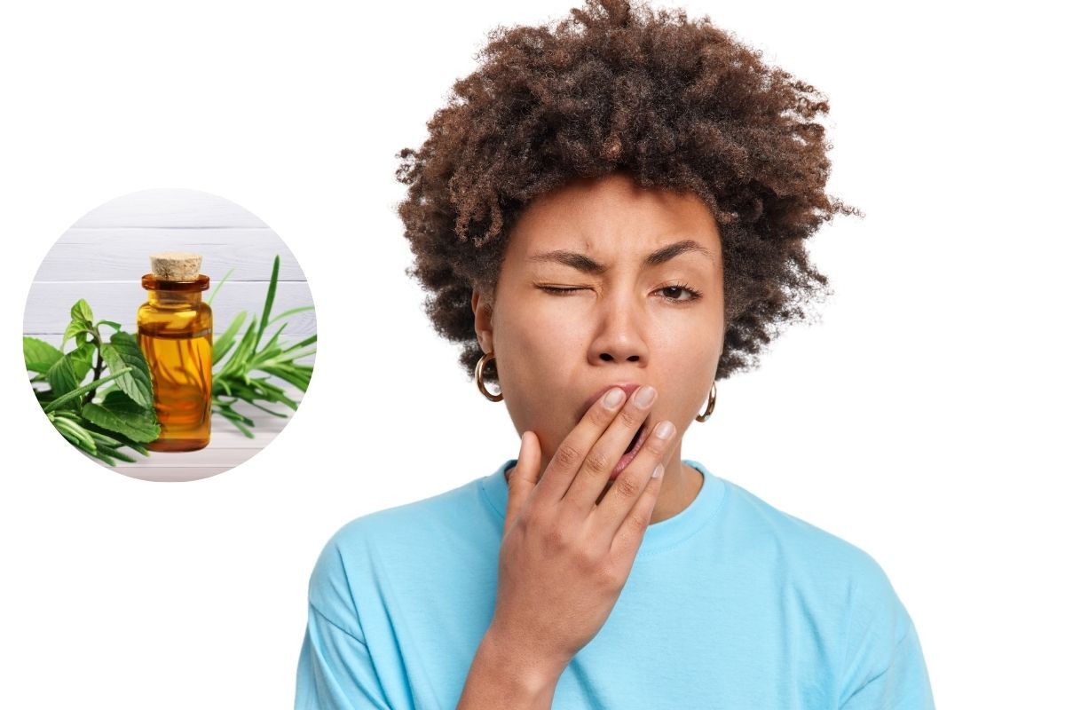 Woman covering her mouth with hand, considering tea tree oil treatment for gum infection.